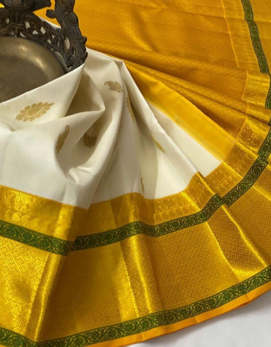 Party Wear Yellow Lichi Silk Jacquard saree with blouse