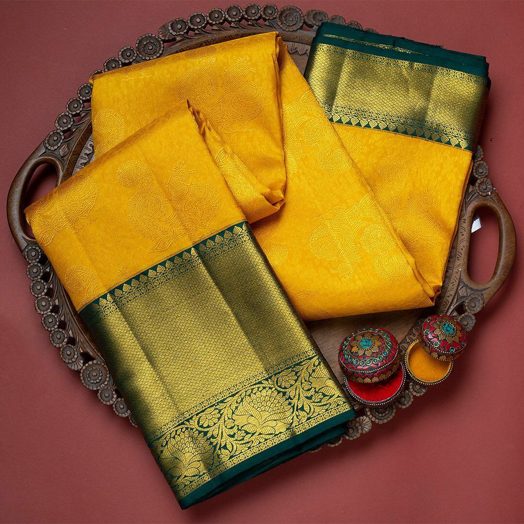 Yellow color Lichi Silk Jacquard saree with blouse