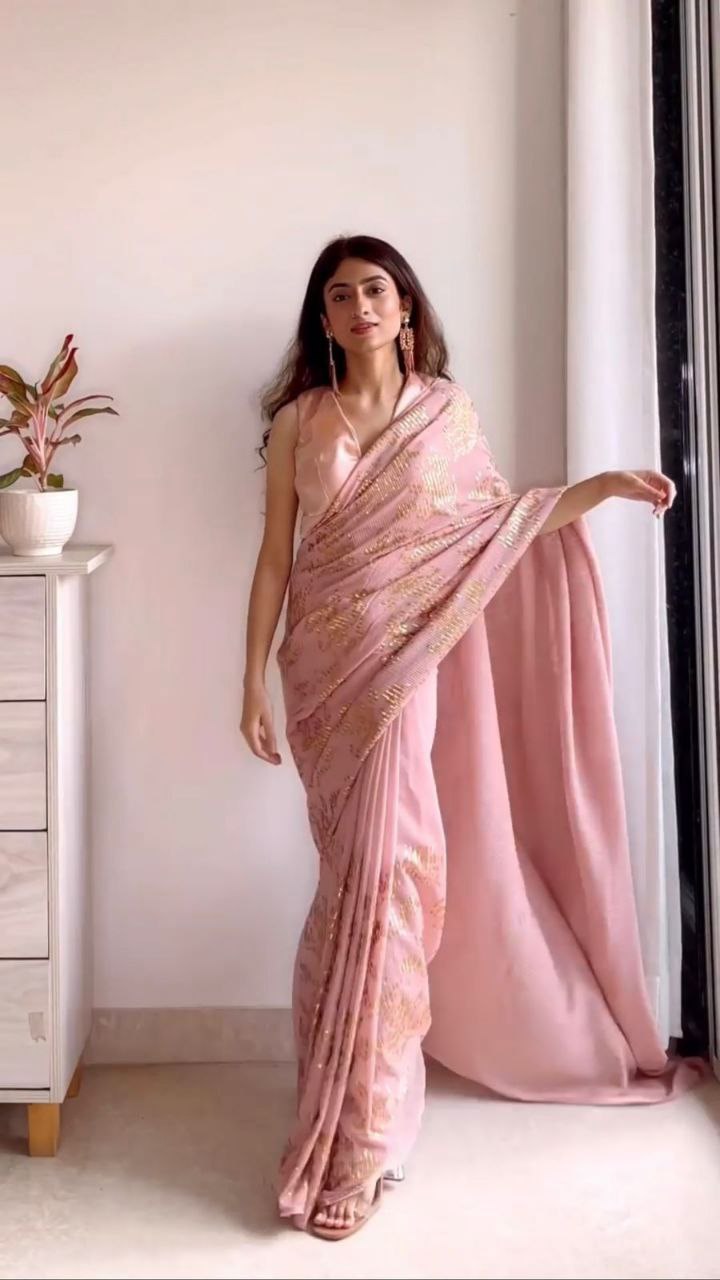 Alluring Peach Color Georgette Sequence Saree