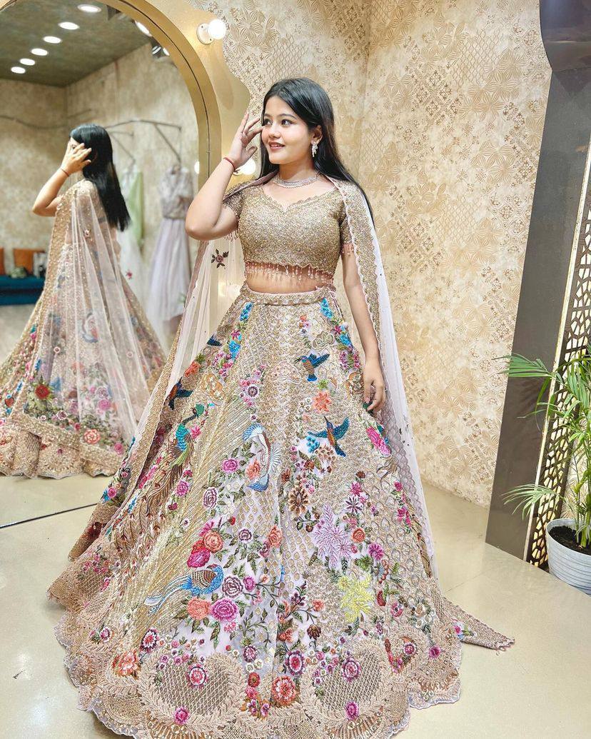 Designer Cream Color Embroidered Sequence Work Satin Silk Lehenga Choli