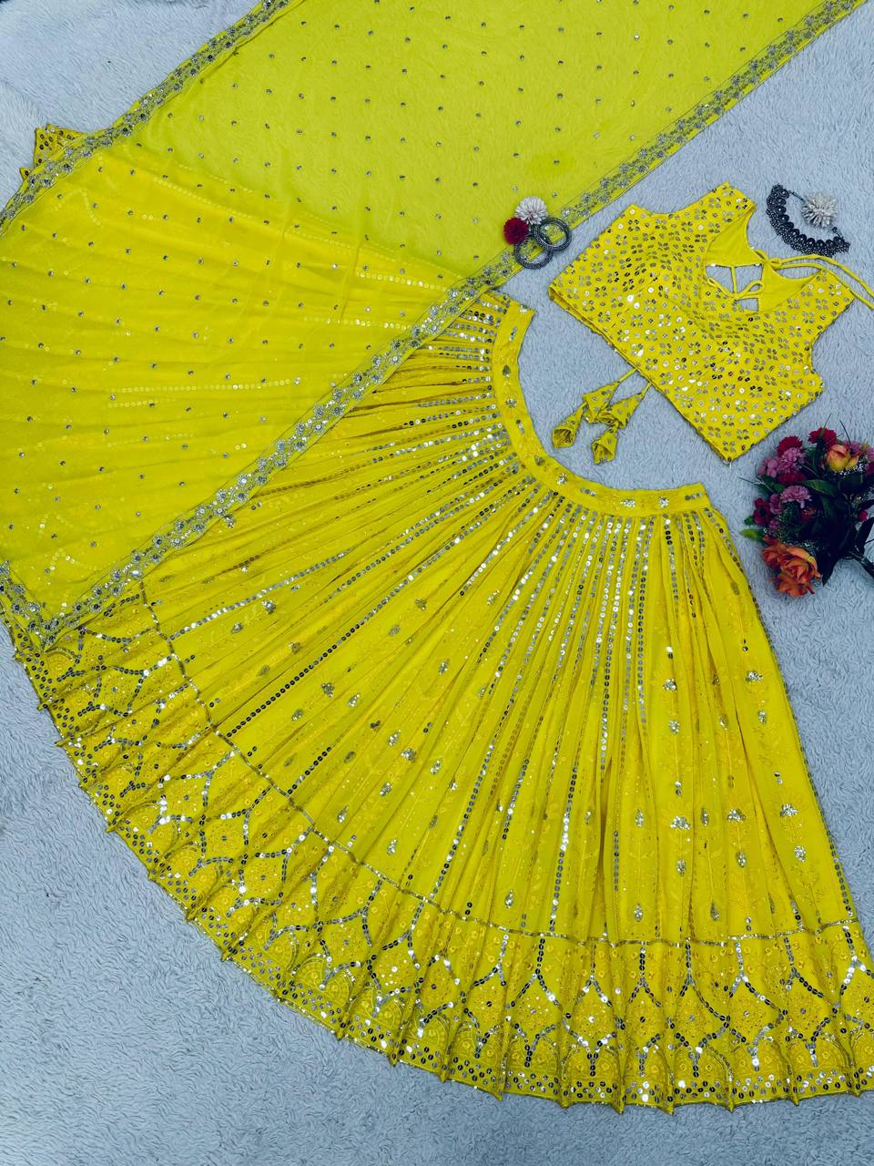 Entrancing Yellow Color Georgette Embroidered Sequence Work Lehenga Choli