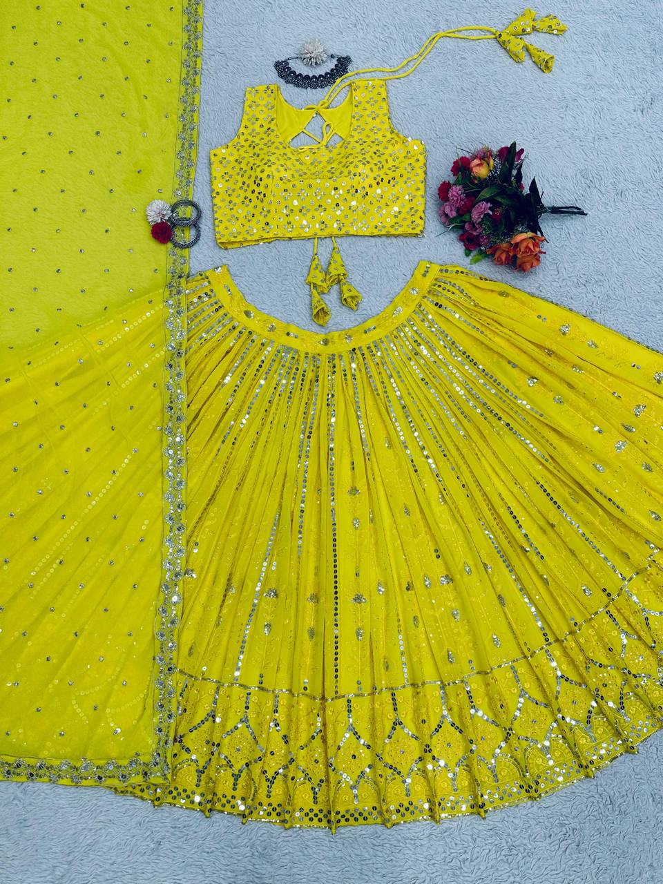 Entrancing Yellow Color Georgette Embroidered Sequence Work Lehenga Choli