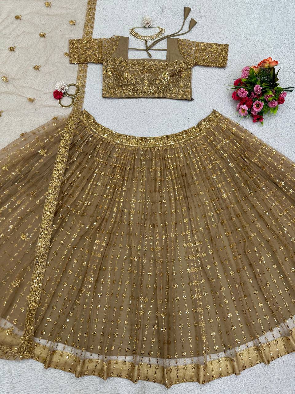 Golden Color Butterfly Net Sequence Work Festive Wear Lehenga Choli