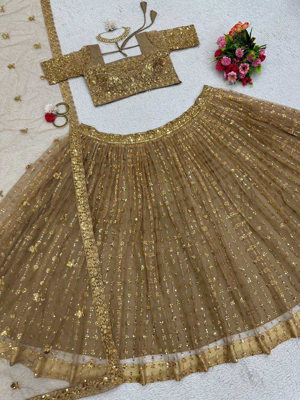 Golden Color Butterfly Net Sequence Work Festive Wear Lehenga Choli