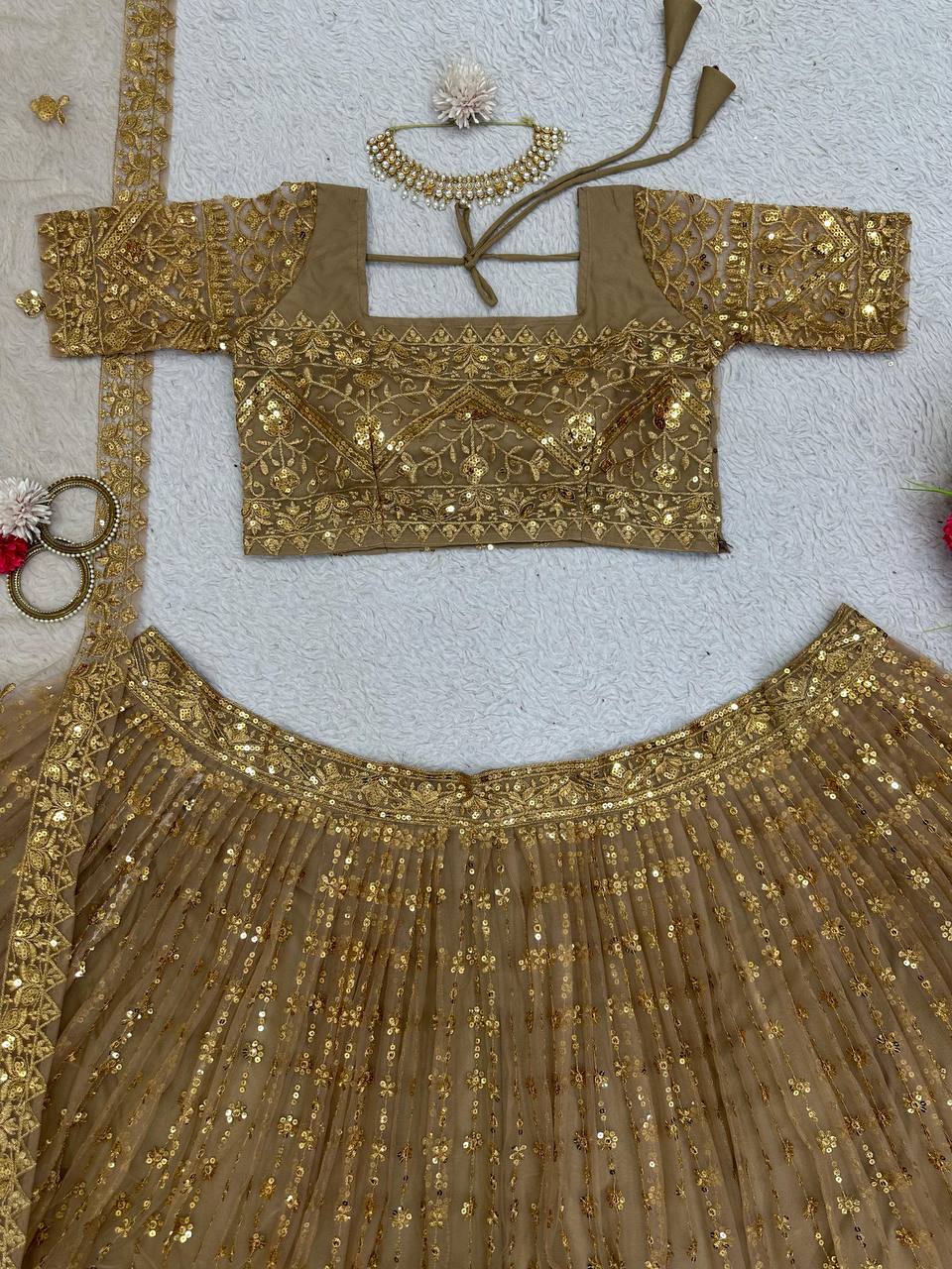 Golden Color Butterfly Net Sequence Work Festive Wear Lehenga Choli