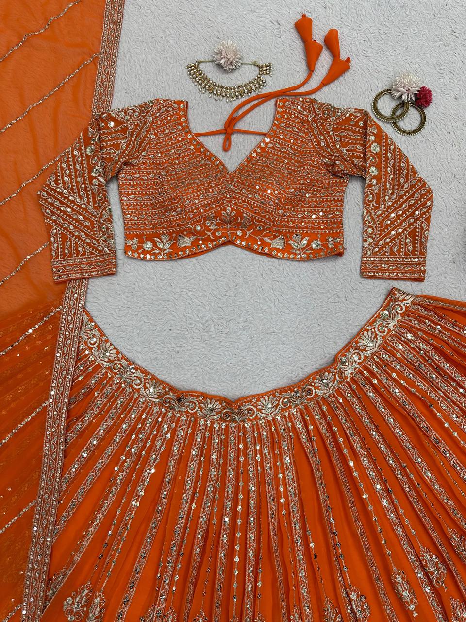 Unique Orange Color Sequence Thread Work Georgette Lehenga Choli