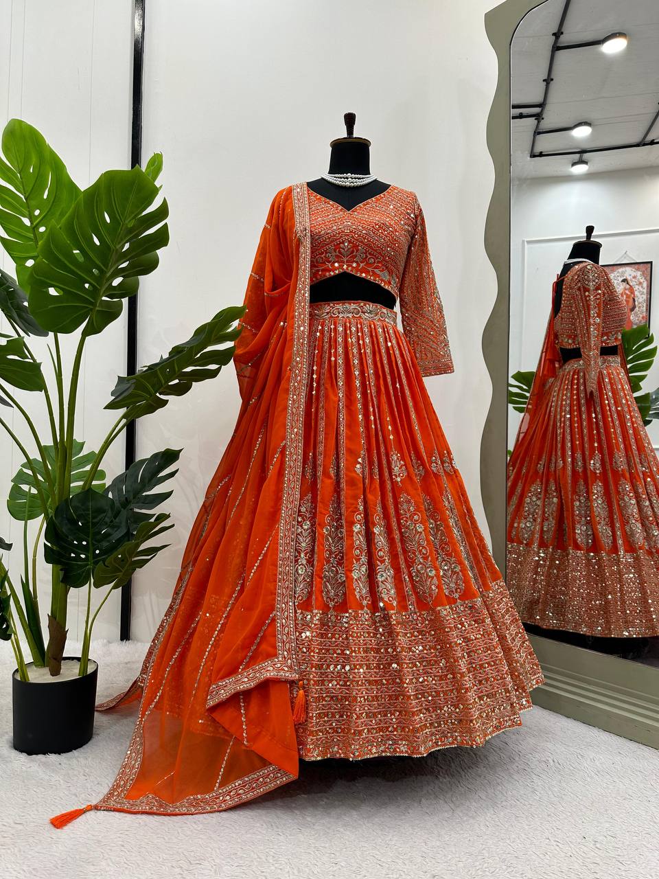 Unique Orange Color Sequence Thread Work Georgette Lehenga Choli