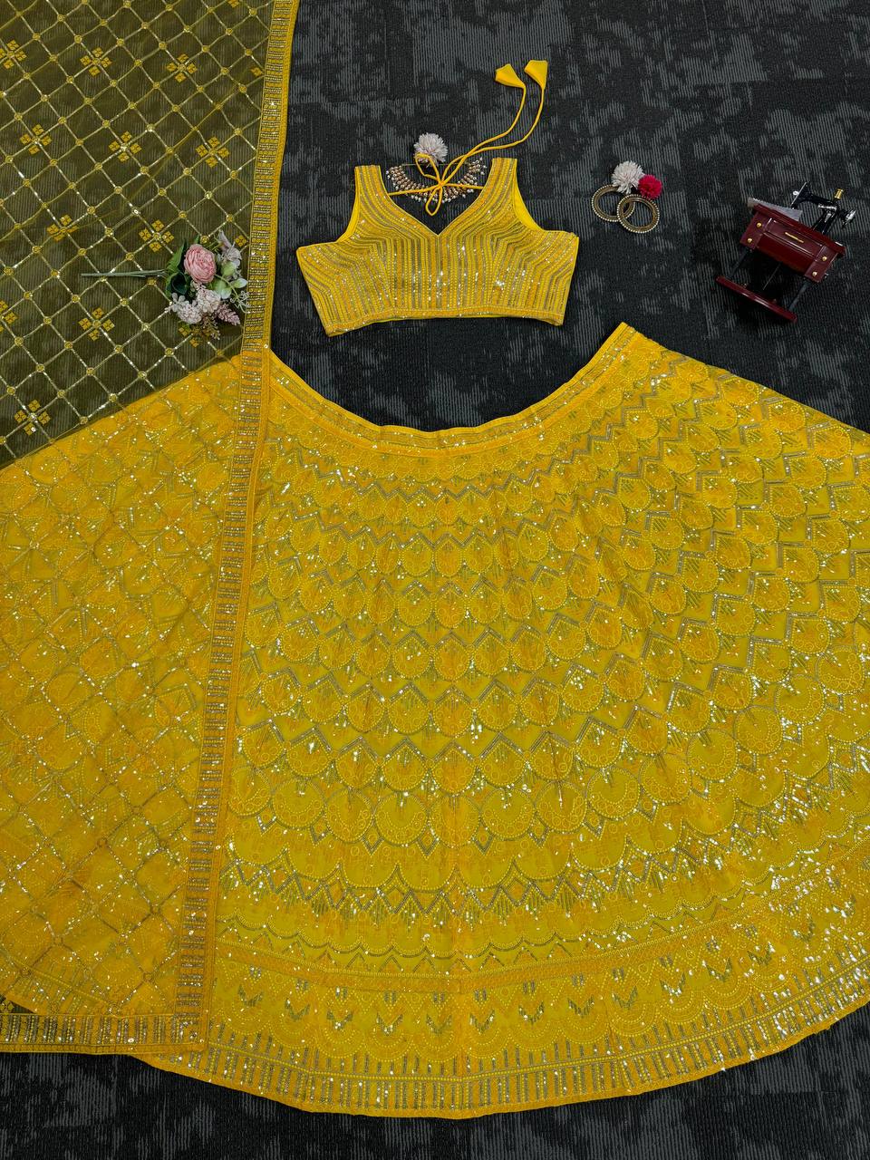 Trendy Yellow Color Faux Georgette Sequence Work Lehenga Choli