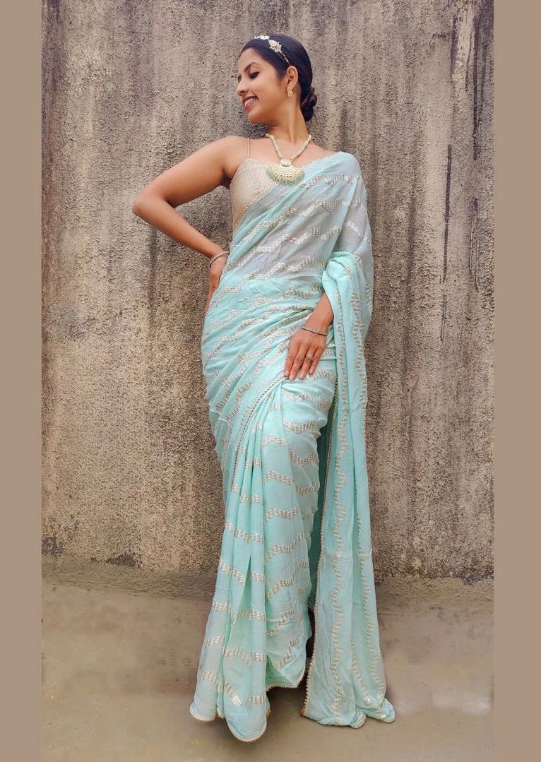 skyblue color Georgette Sequence Work Saree With Samosa Lace