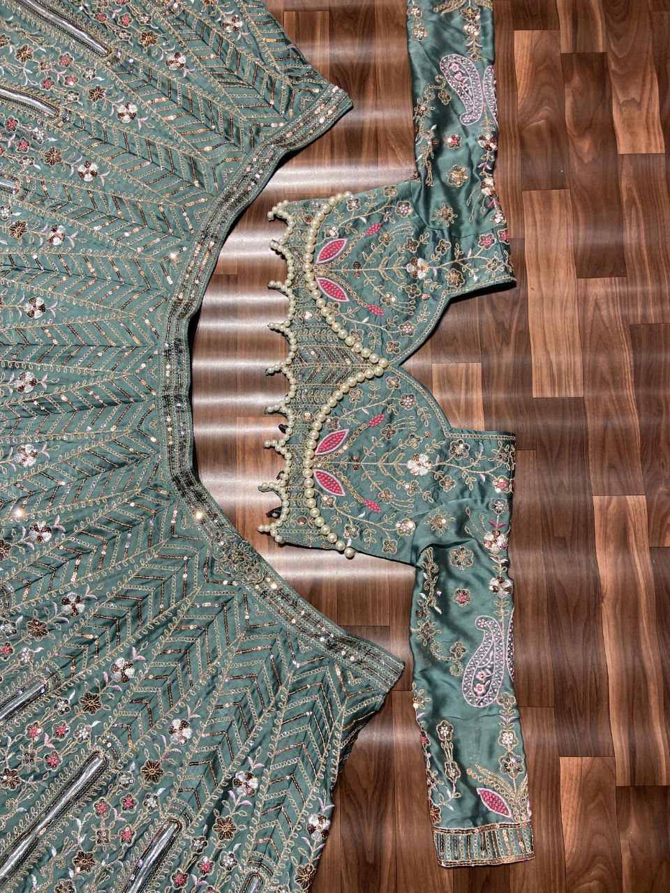 Sea Green Color Embroidered Pearl Kasturi Silk Lehenga Choli