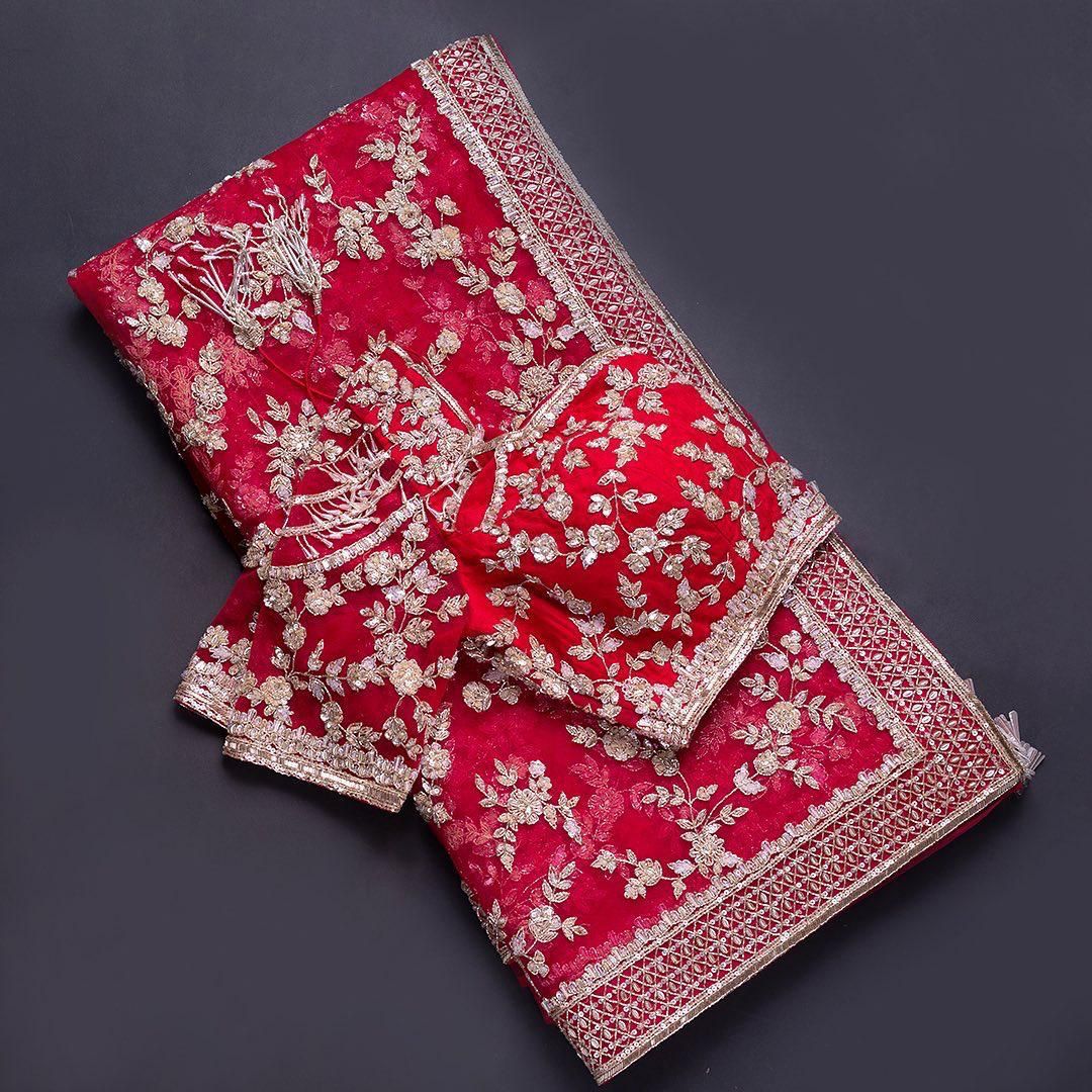 Red color Designer Embroidered saree